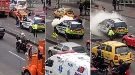 Encapuchados atacan una patrulla y a un policía en una marcha estudiantil en Bogotá (VIDEO)