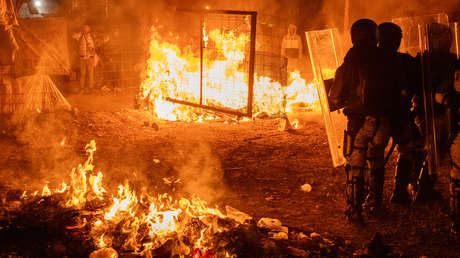 México: Migrantes queman su campamento en Chihuahua en medio de una redada