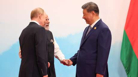 WSJ: Tres líderes cogidos de la mano en la OCS, un "mensaje poderoso" a Trump