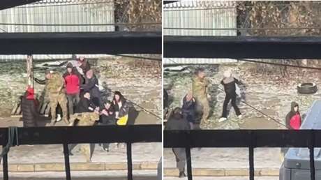 VIDEO: Reclutador ucraniano rocía gas en la cara de una mujer con un niño